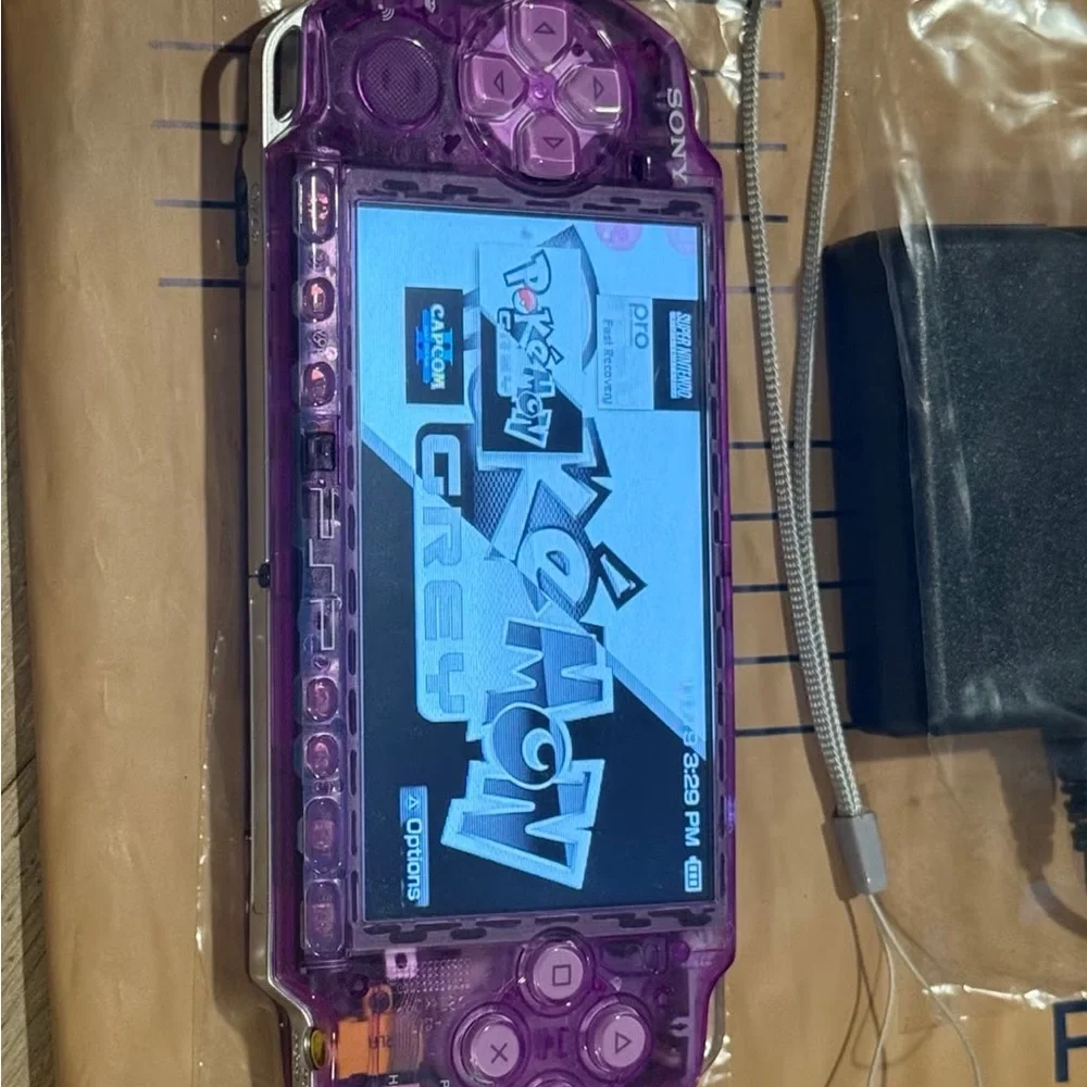 Sony Handheld Console in Transparent Purple